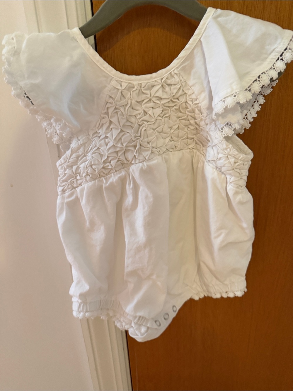 Monica and Andy White Poplin Smocked Baby Romper with Lace Cap Sleeves